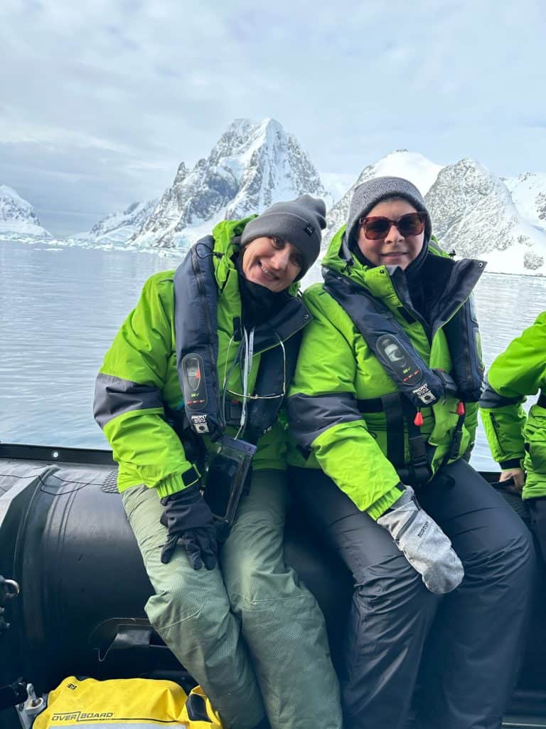 Me and my friend on a Zodiac in Antarctica with Atlas Ocean Voyages expedition cruise