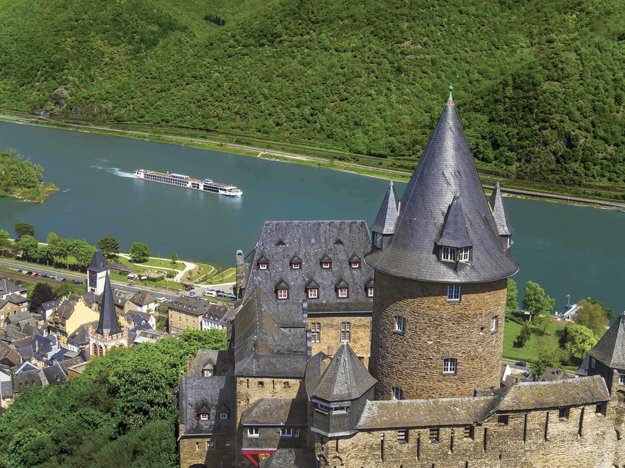Viking Longship on the Rhine River near Stahleck Castle in Bacharach, Germany to demonstrate River cruising