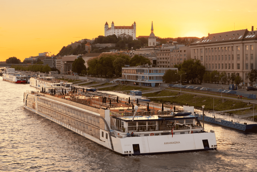 AmaMagna sailing by the castle in Bratislava on the Danube