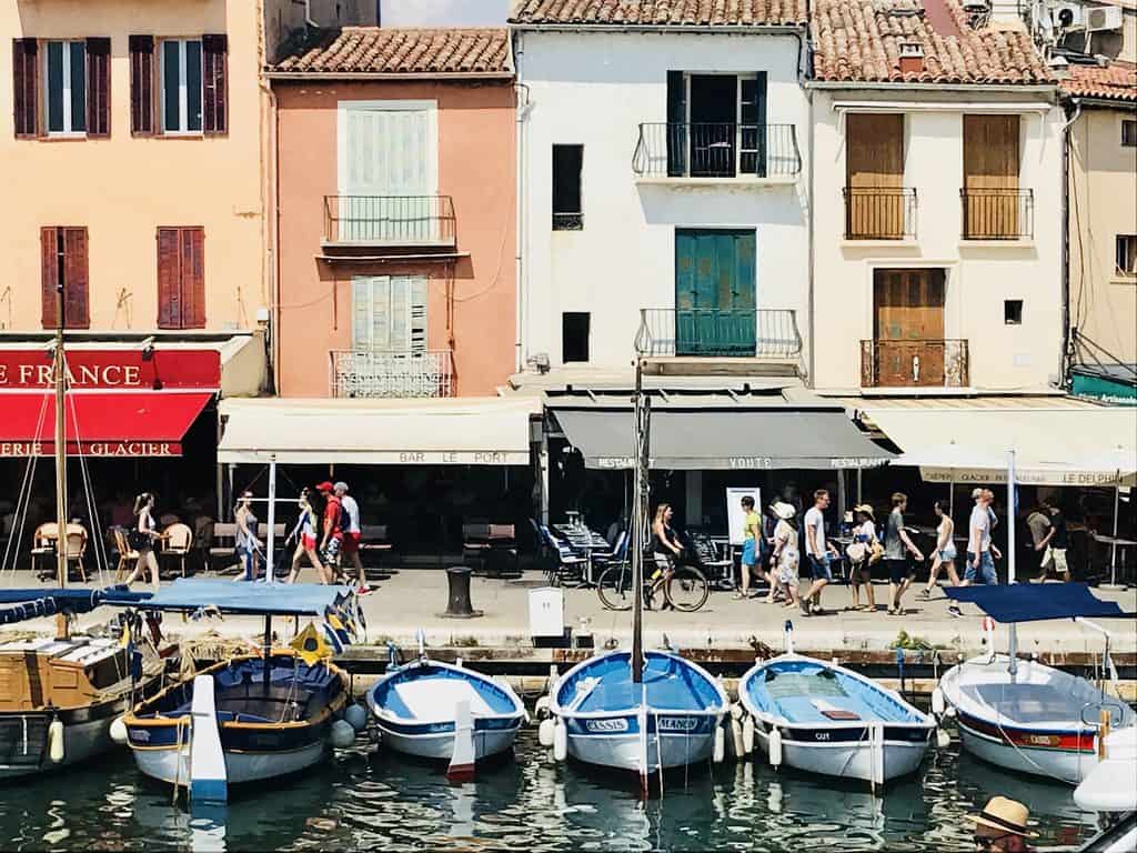 Small boats along the waterfront in Cassis, France
